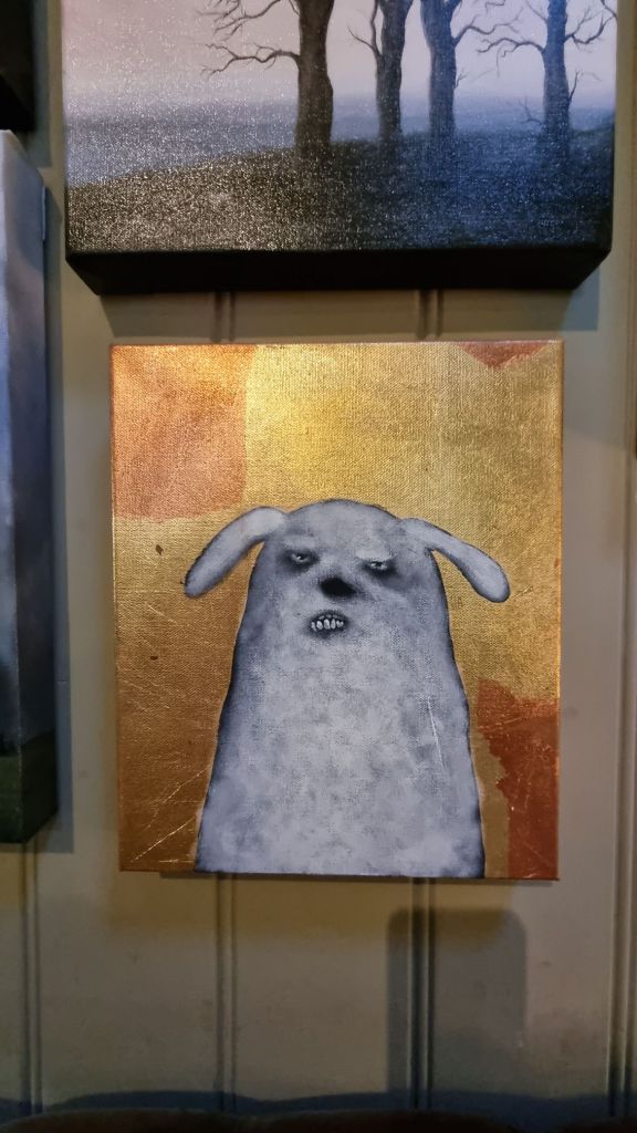 Gold and copper leaf on canvas, an upbeat little critter.