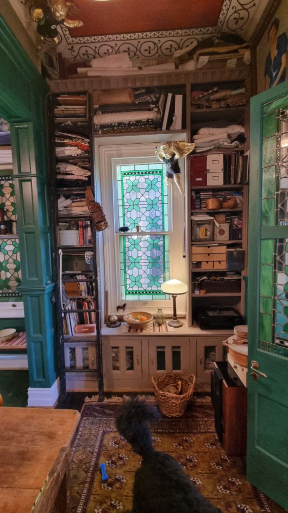 Leadlight, cherub, studio shelves